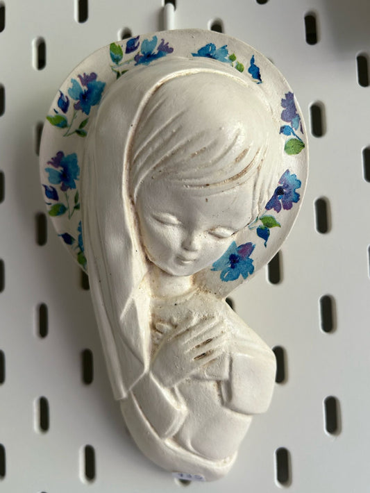 Young Mary with blue flowers halo